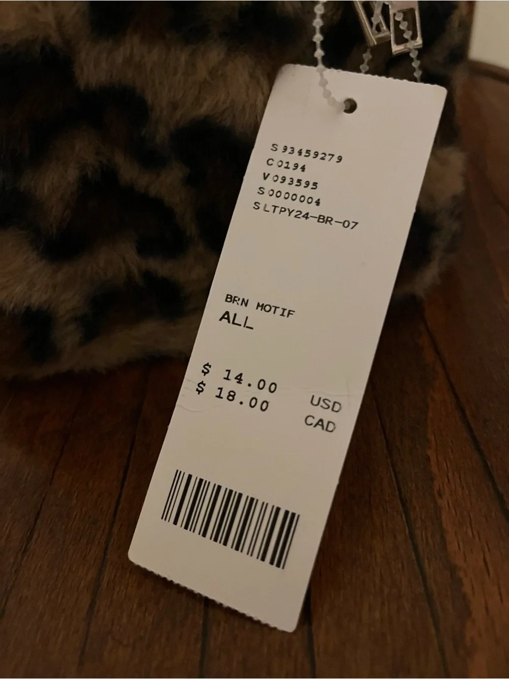 Urban Outfitters plush leopard cosmetic bag